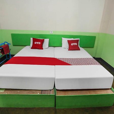Oyo 90825 Hotel Lizha 2 Samarinda Bagian luar foto